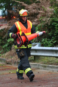 firefighter protecting scene from distracted drivers