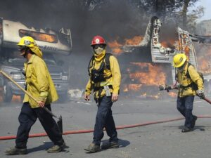 structural firefighters at wildland WUI fires